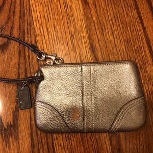 Metallic coach wristlet